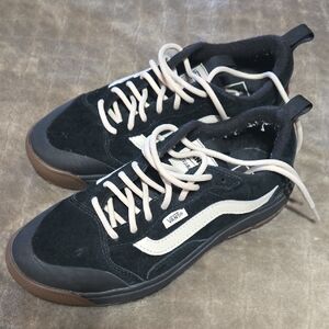 Vans Black Suede Sneakers with White Side Stripe and Gum Sole